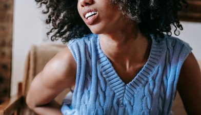 Woman with stomach ulcer pain
